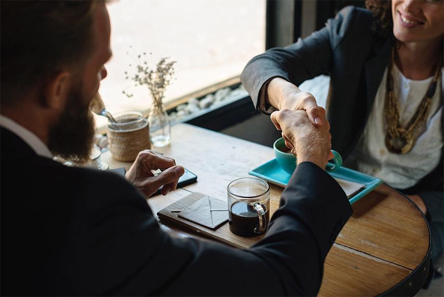 two business people shaking hands