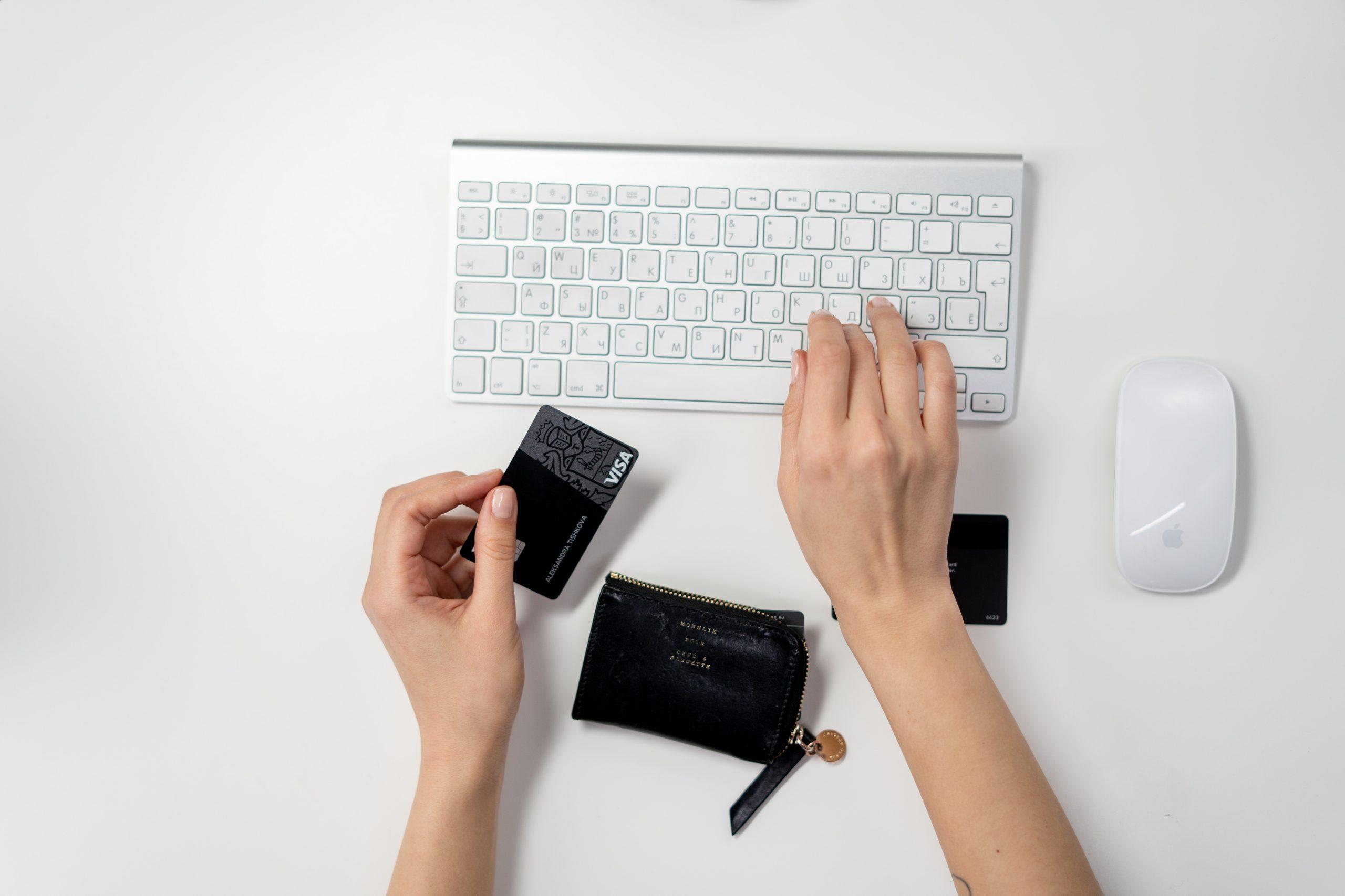 An individual working at a desk, symbolizing the diligent research needed to understand the credit score requirements for an unsecured loan.